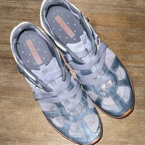 vintage Diesel Moslette sneakers in blue and cream with an orange sole